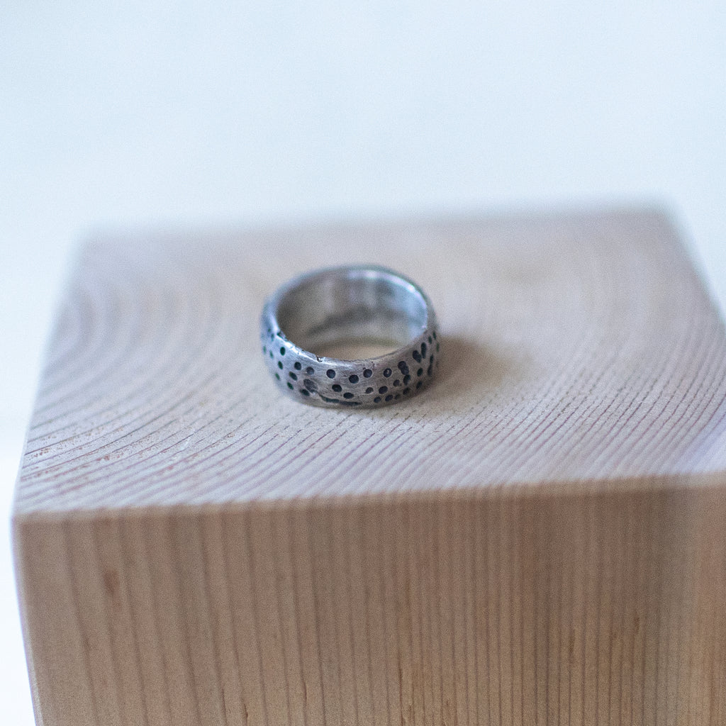 Handcrafted sterling silver ring with bold segmented grooves, The Armadillo size 7 – artisan unisex jewelry with a rugged, textured design."