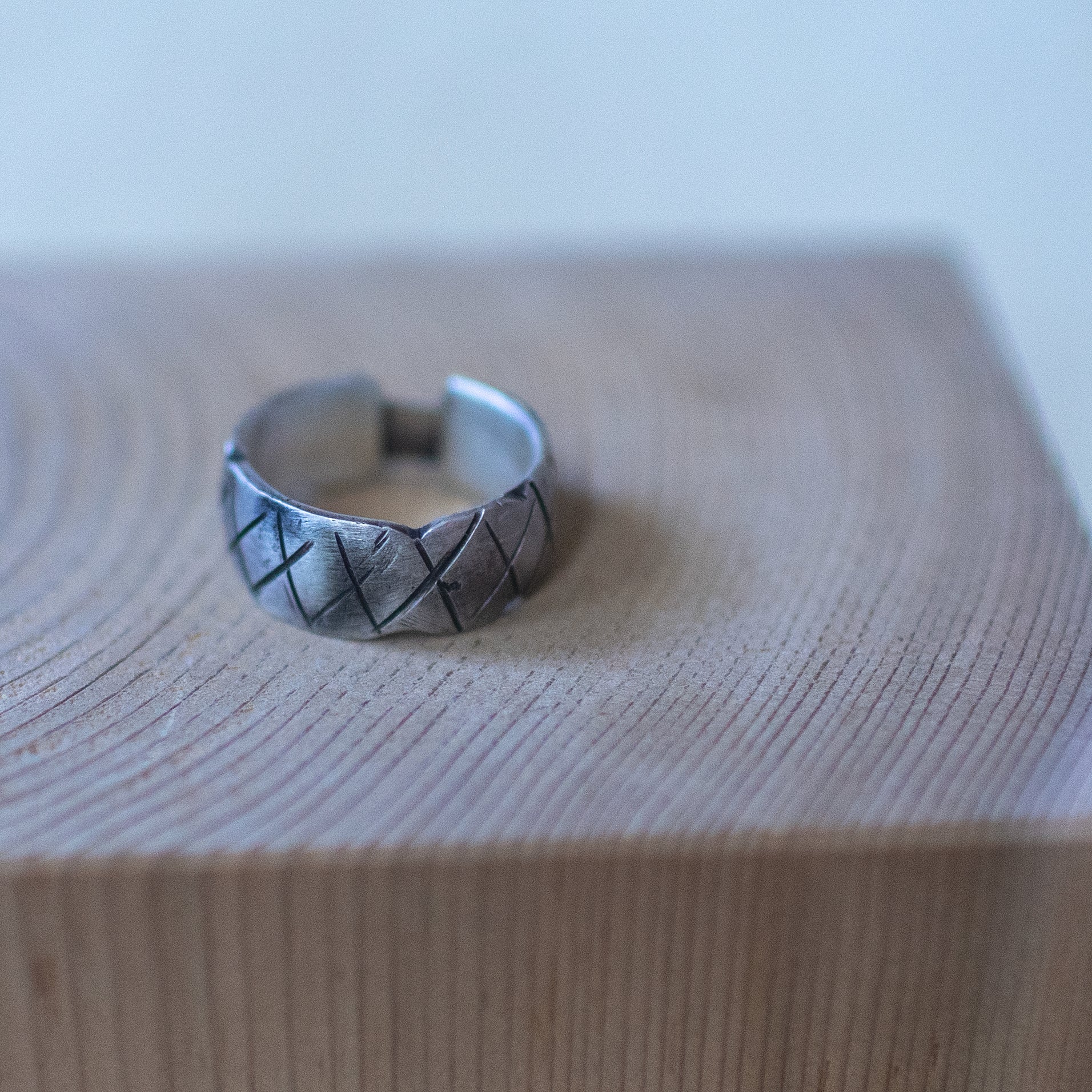 Briefcase ring – handcrafted sterling silver band size 10.5 with rivet-style details and oxidized industrial design, unisex artisan jewelry.