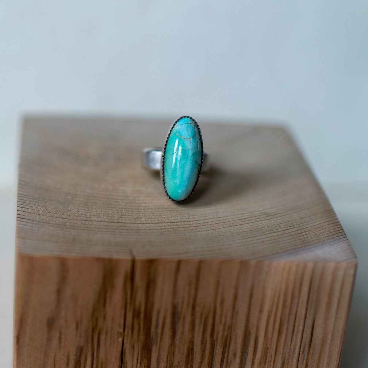 Sonnet ring size 5.25 featuring an elongated Royston turquoise cabochon with blue and green streaks set in sterling silver, handmade jewelry