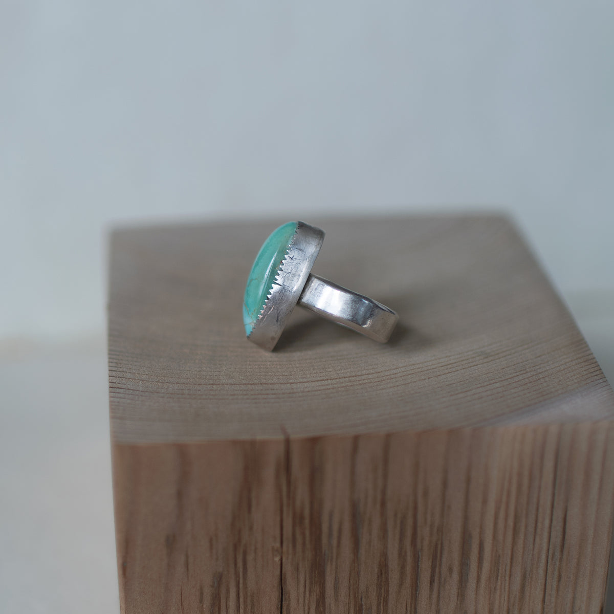 Sonnet ring size 5.25 featuring an elongated Royston turquoise cabochon with blue and green streaks set in sterling silver, handmade jewelry