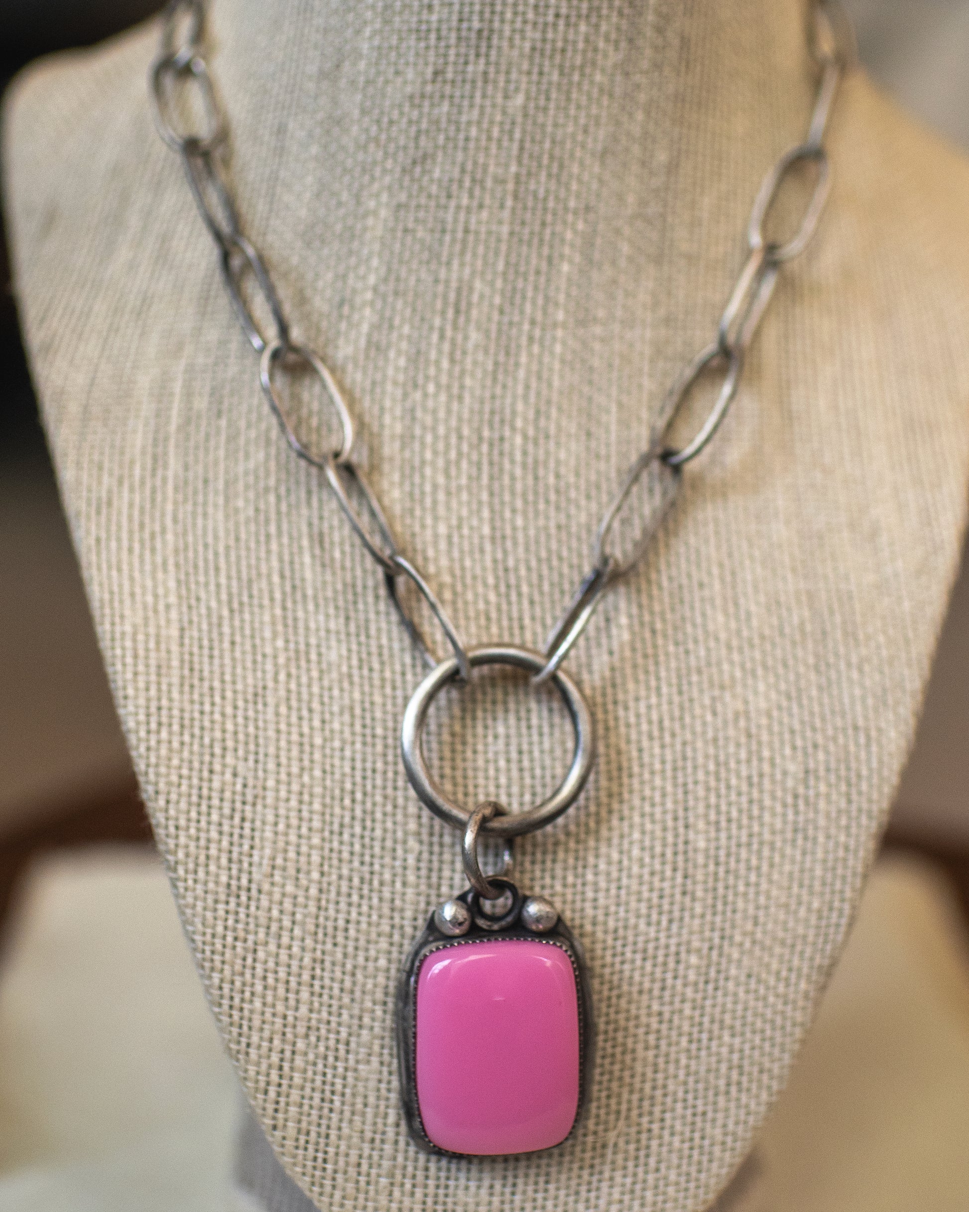 sterling silver necklace with a pink rosarita  pendant 