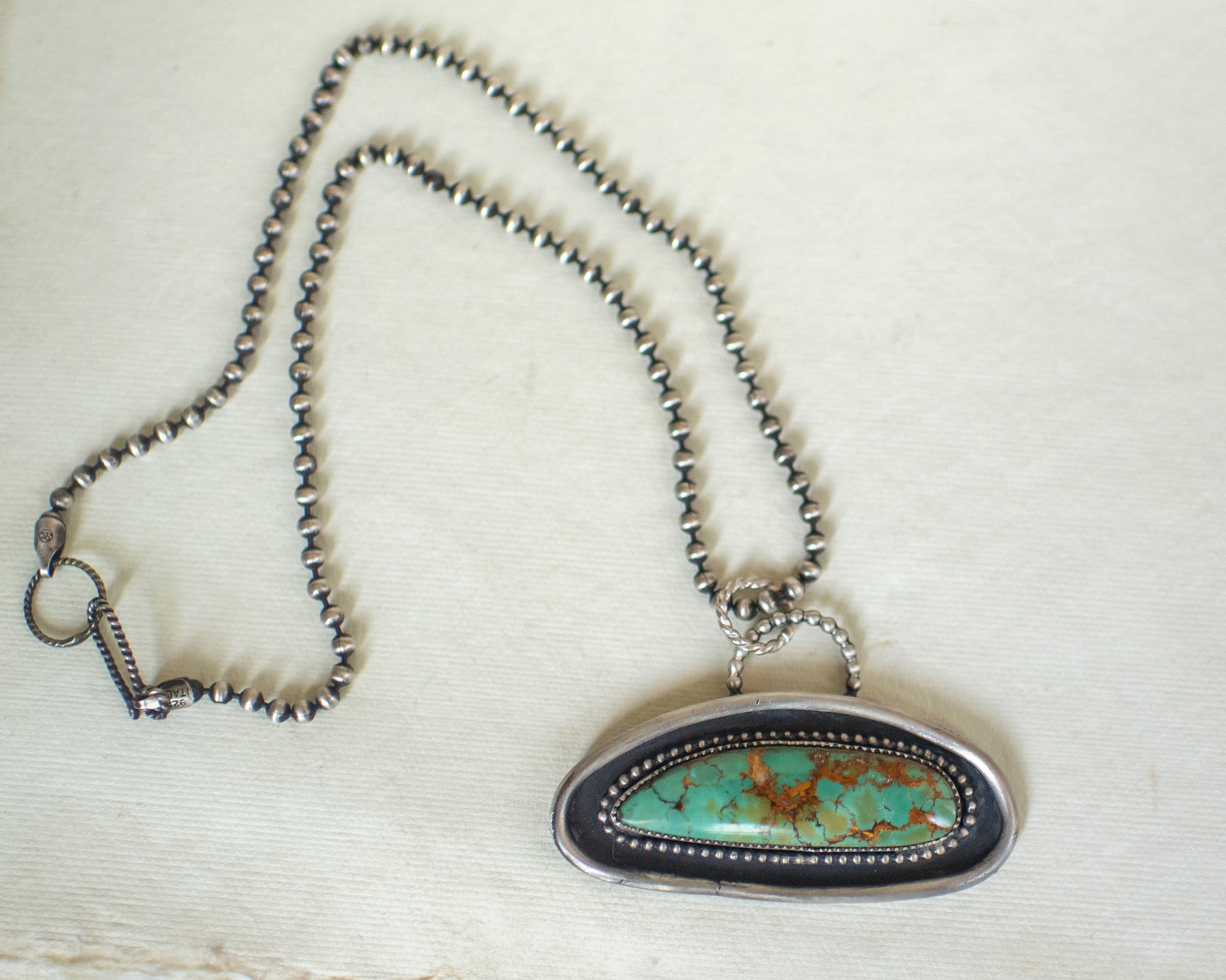 Sterling Silver Necklace with a turquoise pendant
