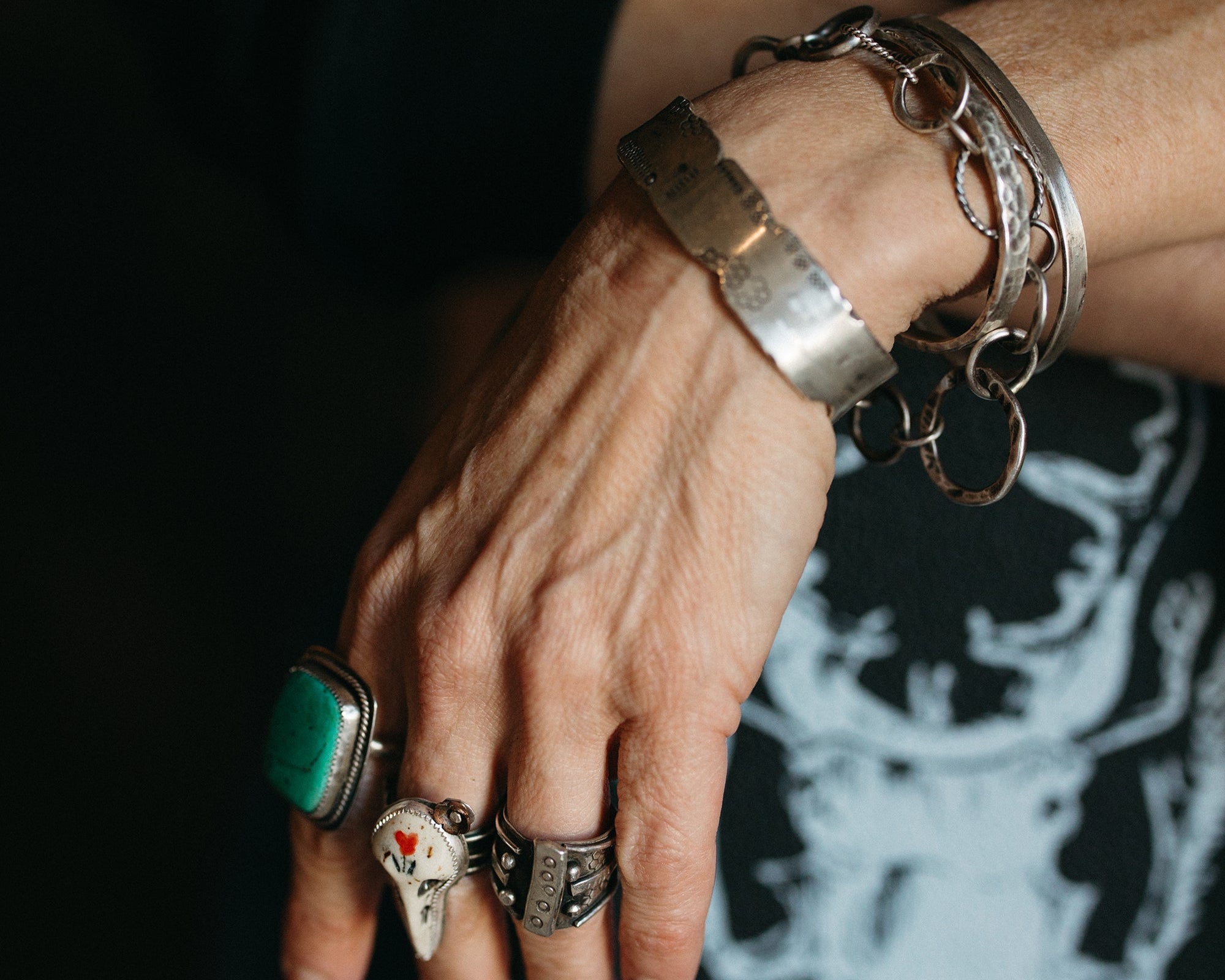 cool womans style with sterling silver and turquoise rings and bracelets 